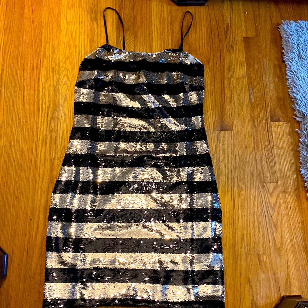 Black and gold sequin dress